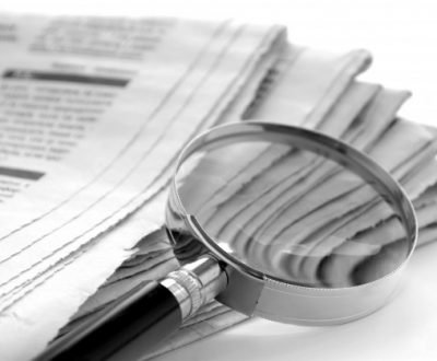 daily-newspaper-magnifying-glass-find-news_124595-406